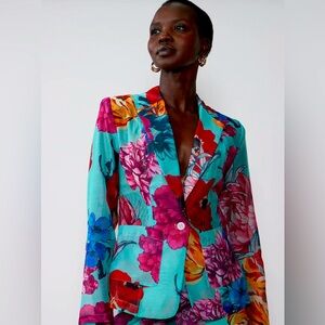 Explosion of blossoms, color & style. Oversized floral print organza blazer.